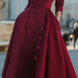 Elegancka sukienka midi z kołnierzykiem i guzikiem z paskiem